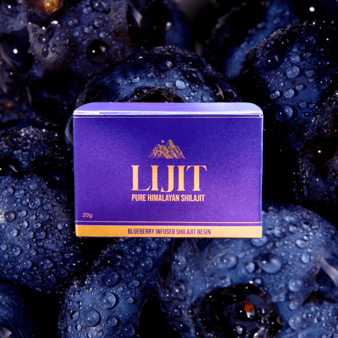 Lijit Blueberry-Infused Shilajit Resin on blueberries with water droplets