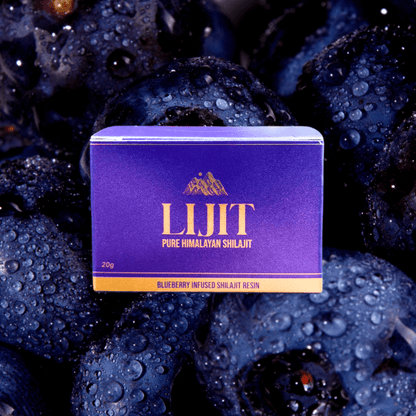 Lijit Blueberry-Infused Shilajit Resin on blueberries with water droplets