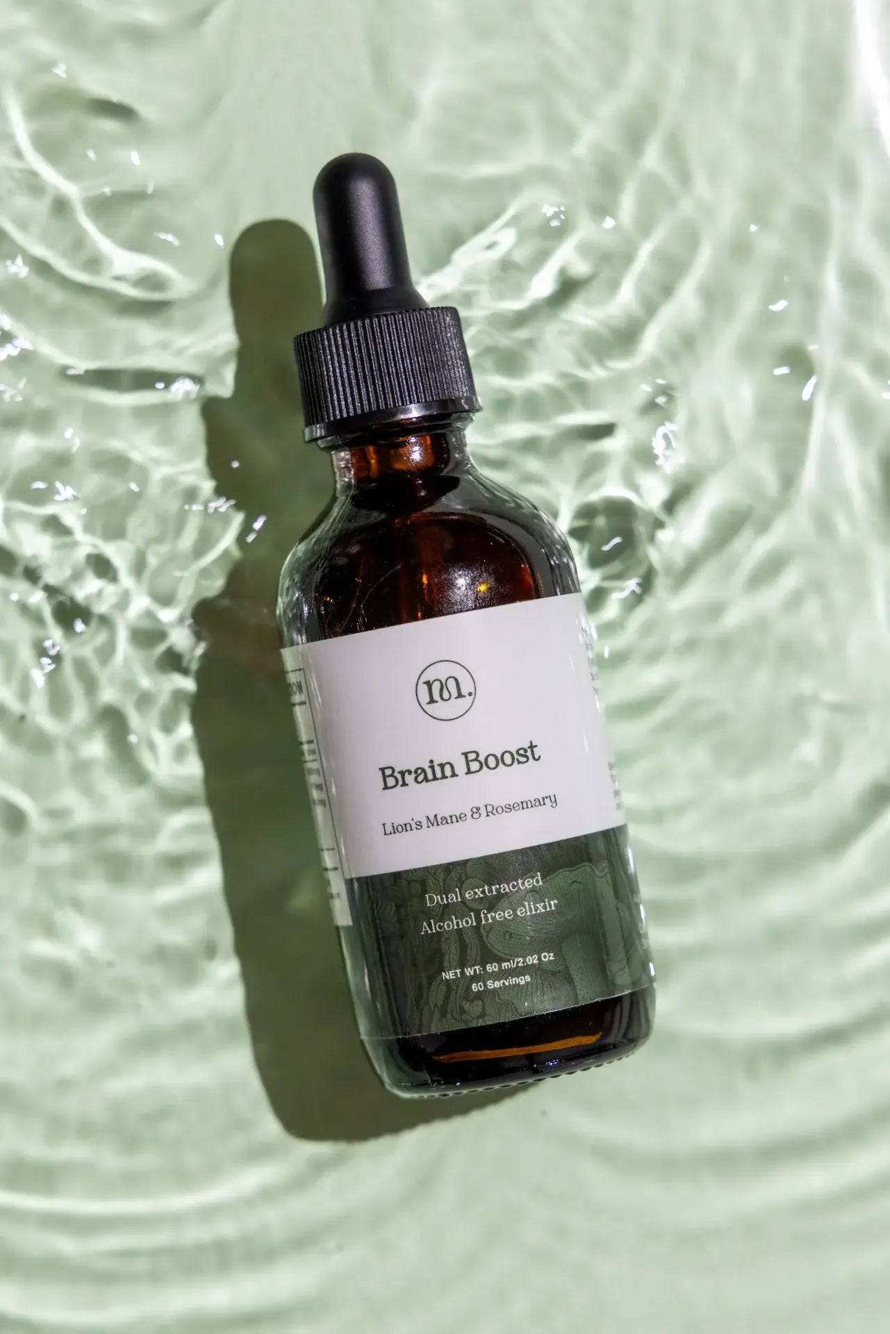 Bottle of 'Brain Boost' on a textured green background