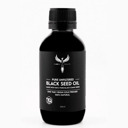 Black bottle of pure unfiltered black seed oil on a white background