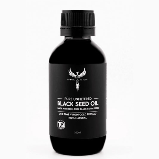 Black bottle of pure unfiltered black seed oil on a white background