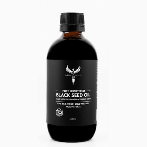 Bottle of pure unfiltered black seed oil on a white background